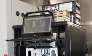 Electrical Ground Support Equipment consisting of a rack of equipment and display screen.