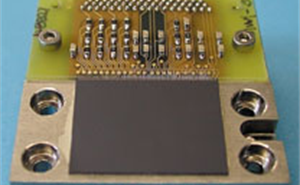 A printed circuit board with CMOS Active Pixel Sensor.