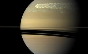 View from Cassini of a storm in Saturn's northern hemisphere. To bands of storm with turbulent patterns are pictured.