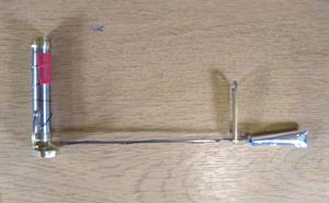 Heat switch wearing a tiny MLI jacket. 