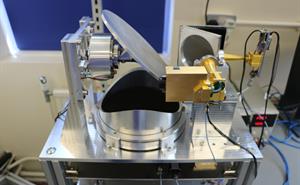 The HYMS instrument on a lab work bench.