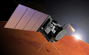 A spacecraft over the surface of Mars.