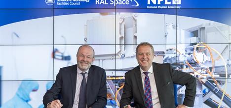 Dr Brian Bowsher, CEO STFC and Dr Peter Thompson, CEO NPL sign an agreement to bring together the two organisations' expertise.
