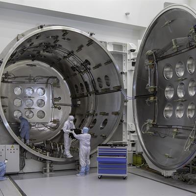 Thermal vacuum test chamber in use by engineers