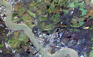 Satellite image showing fields and a large river