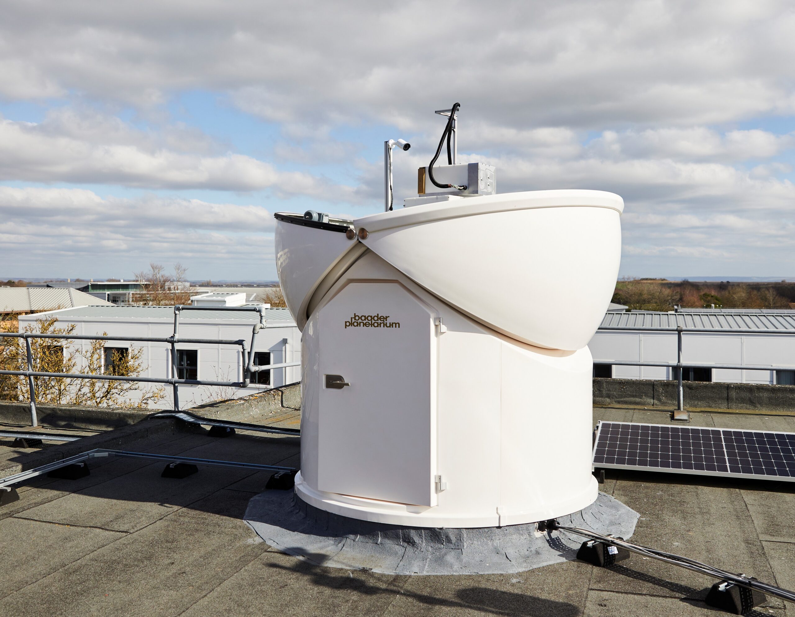 RAL Space's Fourier Transform Spectrometer, which is part of the TCCON network. It is located inside a telescope dome on the roof of a building.