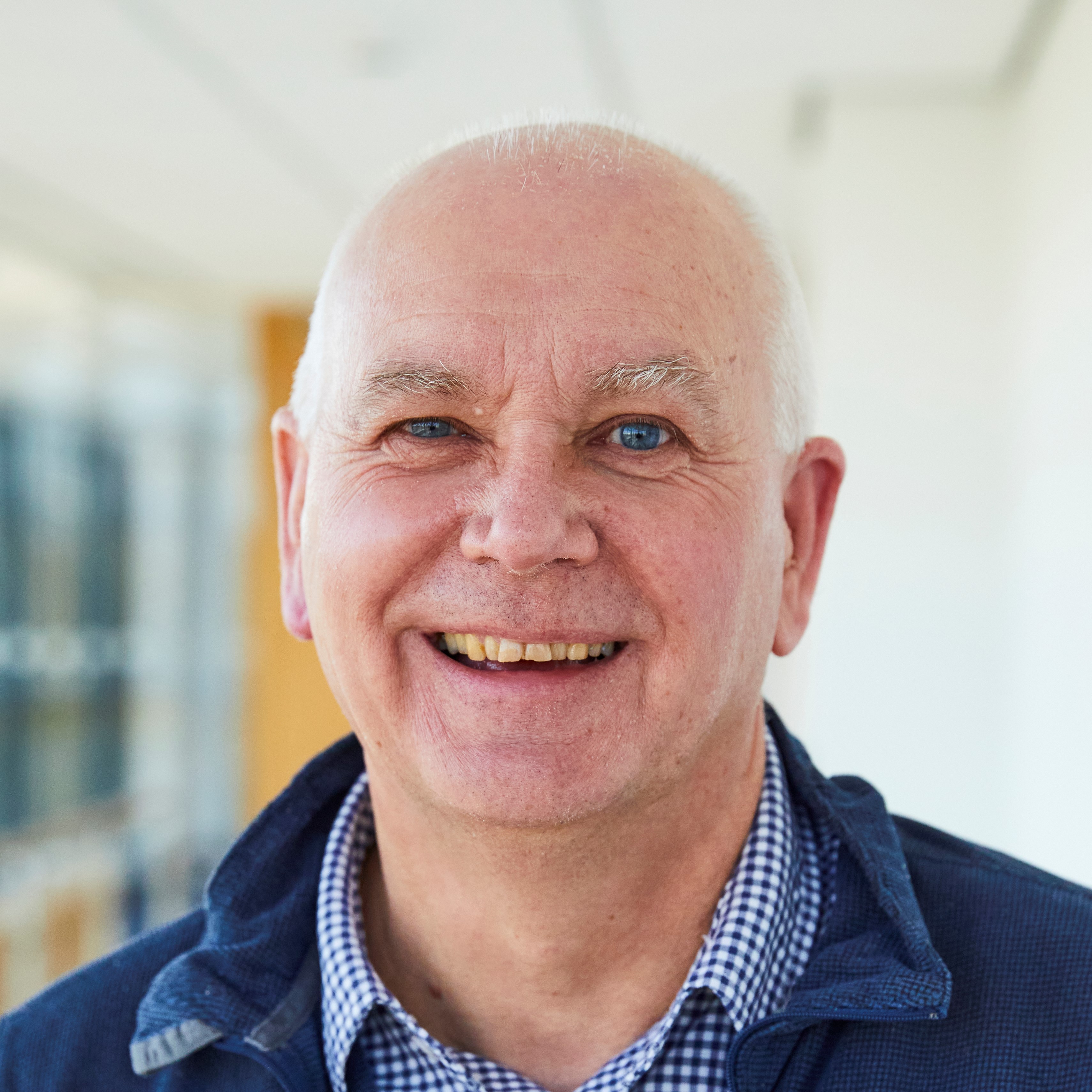 Chris Mutlow smiling, stood inside RAL Space.