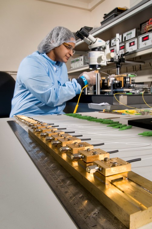 Cleanroom photomixer production in volume for the ALMA radio telescope