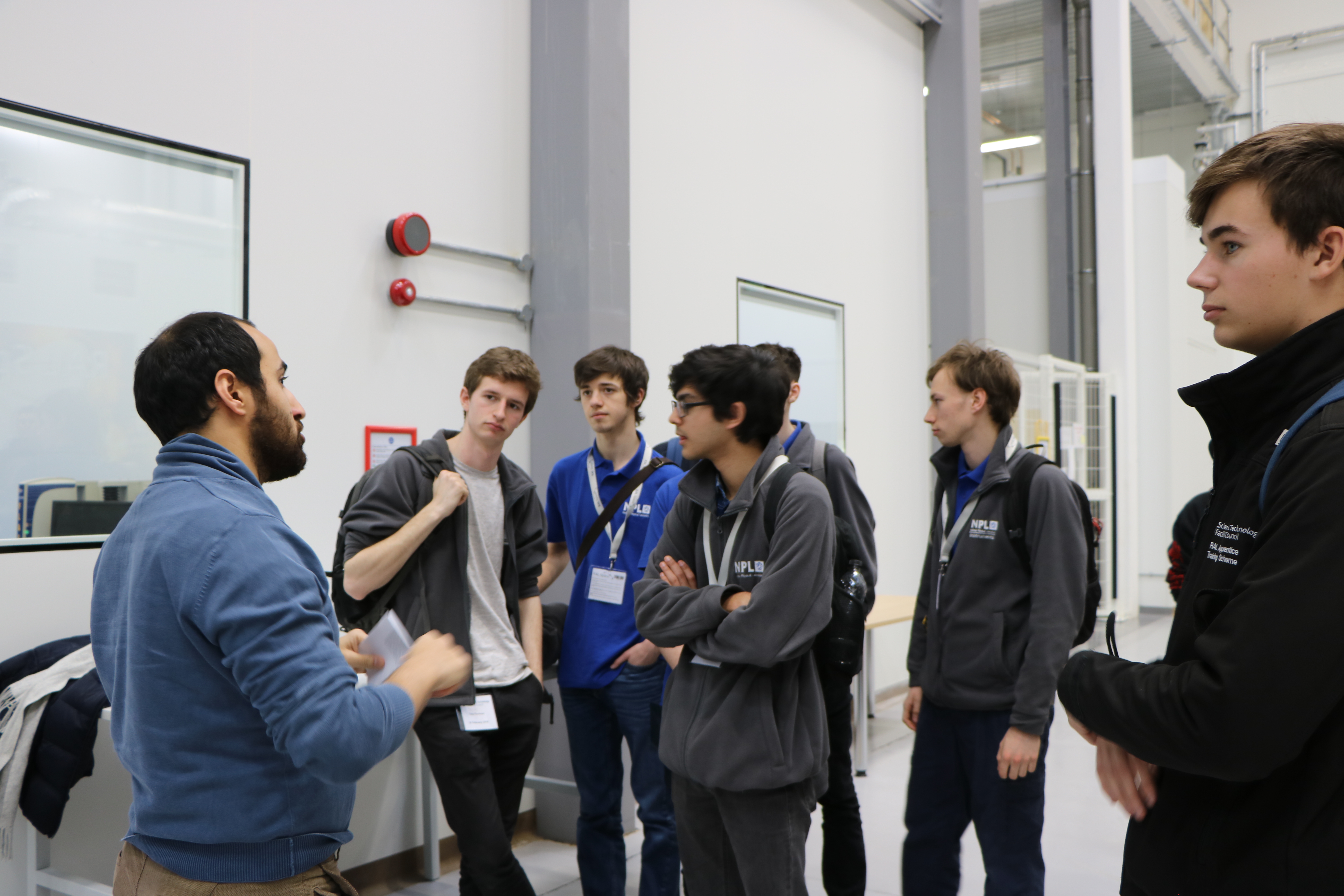 Apprentices from NPL and STFC inside the main facilities hall at RAL Space