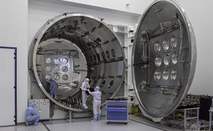 Thermal vacuum test chamber in use by engineers
